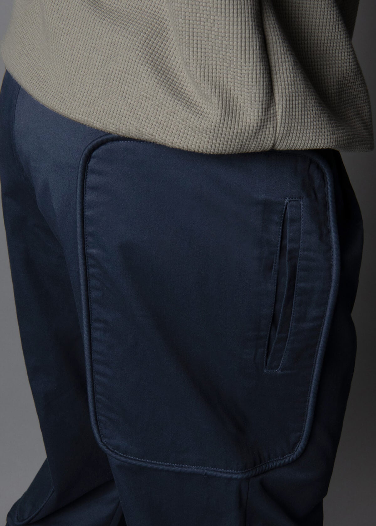 exaggerated pockets made by using an old military piping detail